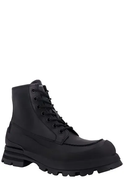 ALEXANDER MCQUEEN Men's Black Leather Ankle Boots with Oversized Sole and Iconic Logo Print